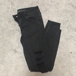 Black distressed skinny jeans